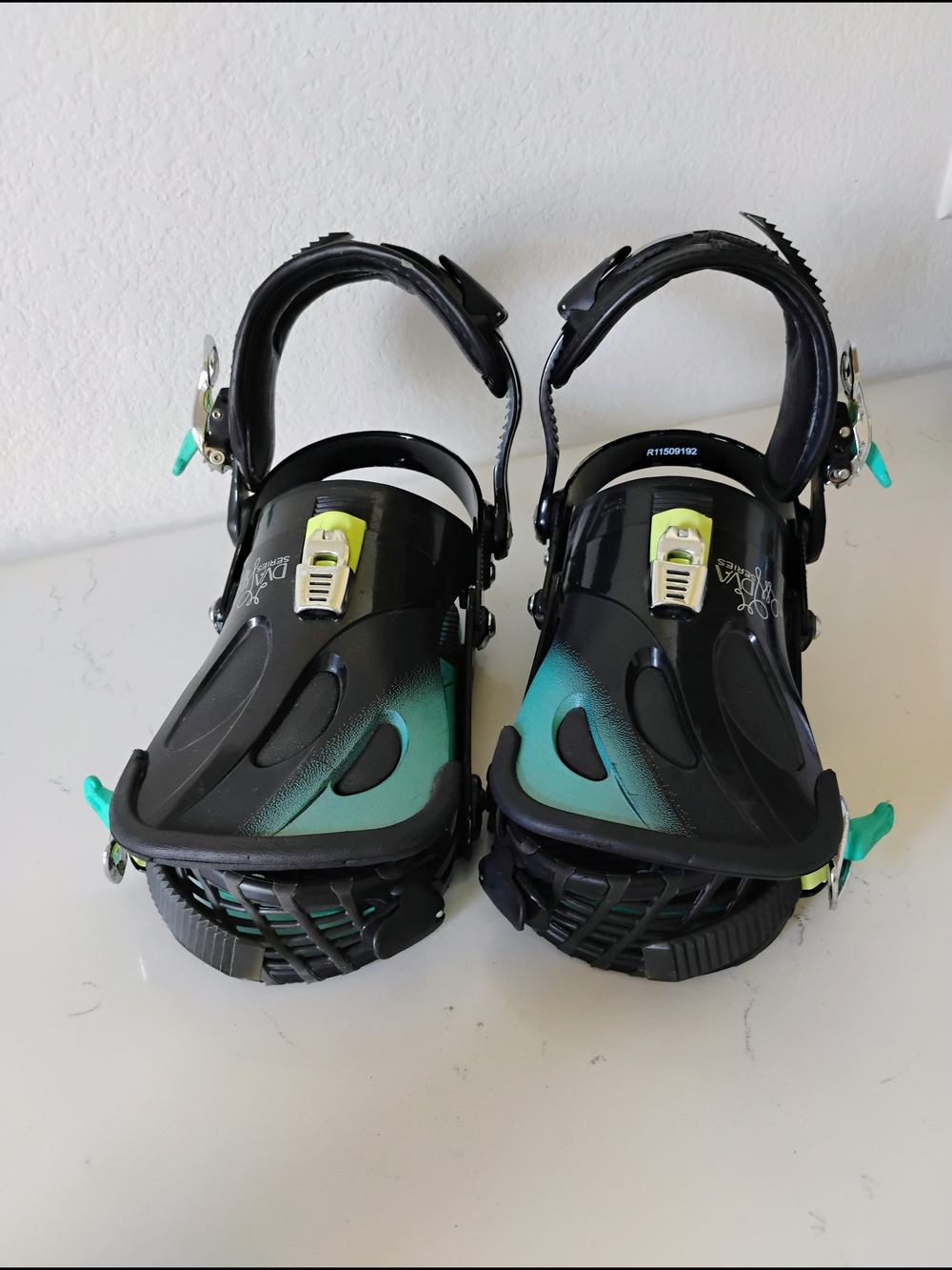 Black and Teal Snowboard Bindings